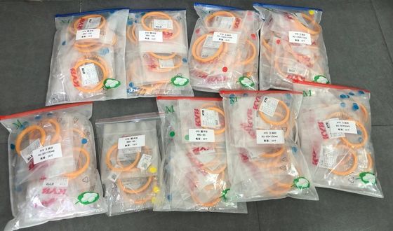 진짜 KYB KAYABA 55*70*9 굴삭기 라드씰은 오렌지색 열 가소성 폴리우레탄 수지를 장비를 답니다